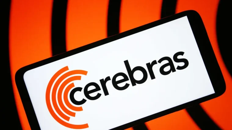 A close-up image of a Cerebras Systems AI chip wafer, showing intricate circuitry and advanced design.
