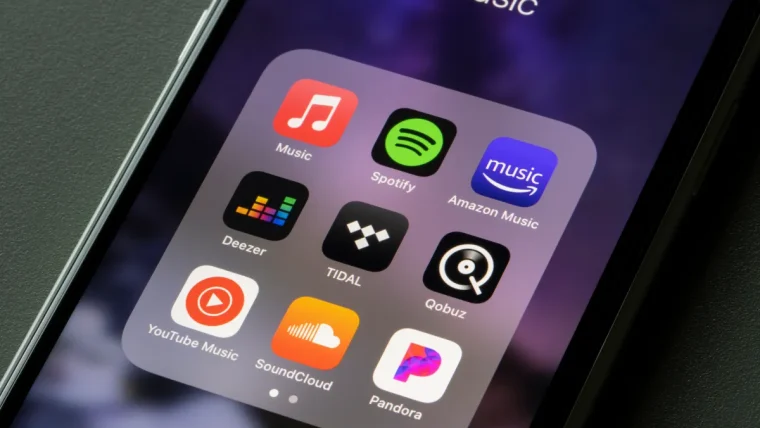 A screenshot of the Deezer AI music detector interface showing a playlist being scanned for AI-generated tracks.