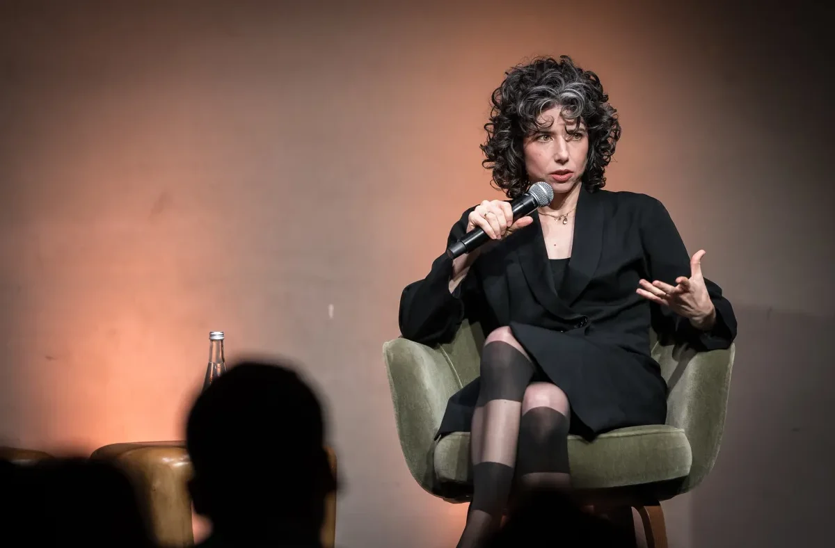 Meredith Whittaker, President of Signal, speaking at a technology conference about AI and privacy.