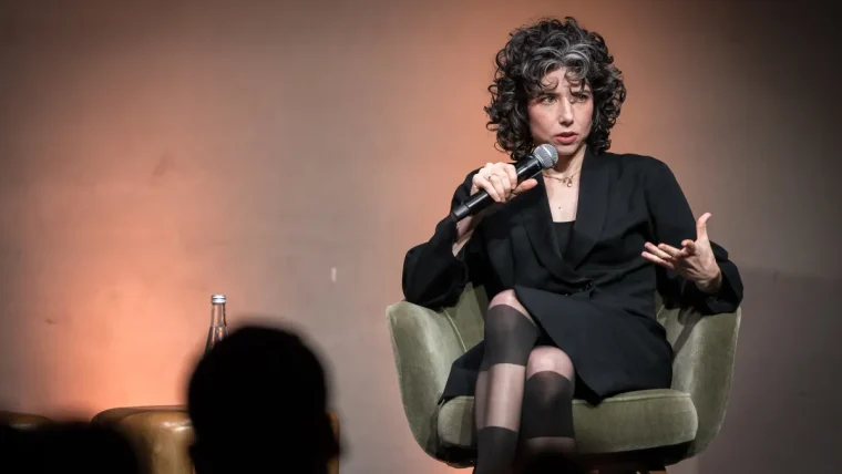 Meredith Whittaker, President of Signal, speaking at a technology conference about AI and privacy.
