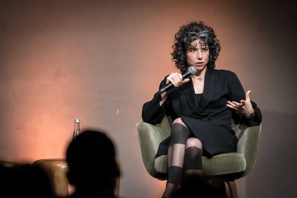 Meredith Whittaker, President of Signal, speaking at a technology conference about AI and privacy.