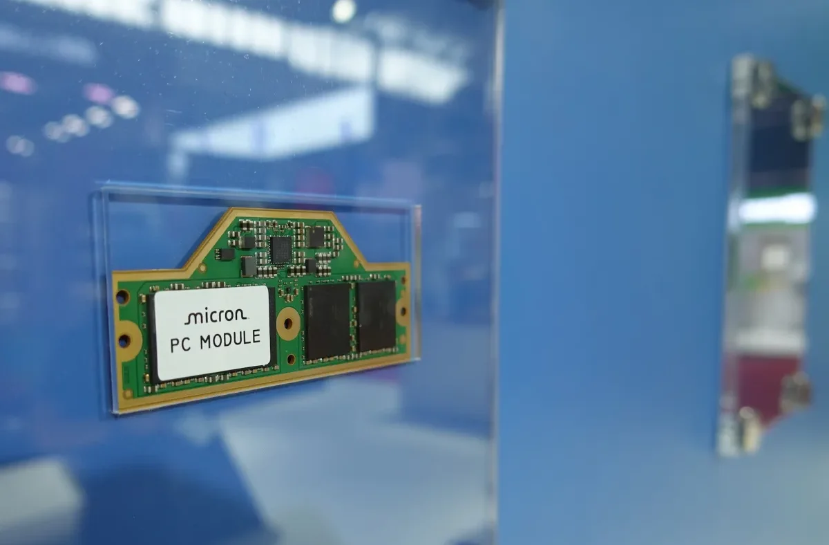 Close-up of Micron High-Bandwidth Memory (HBM) chips integrated into a circuit board for AI servers.