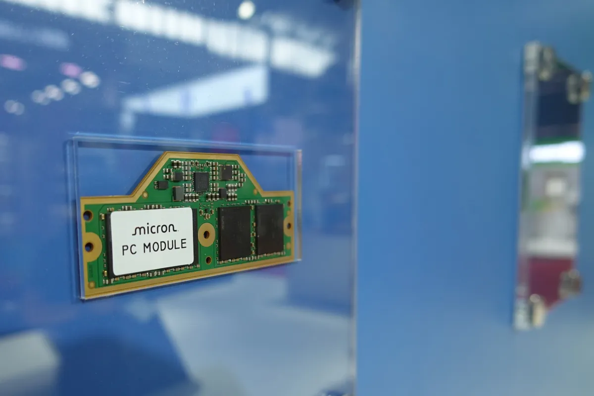 Close-up of Micron High-Bandwidth Memory (HBM) chips integrated into a circuit board for AI servers.