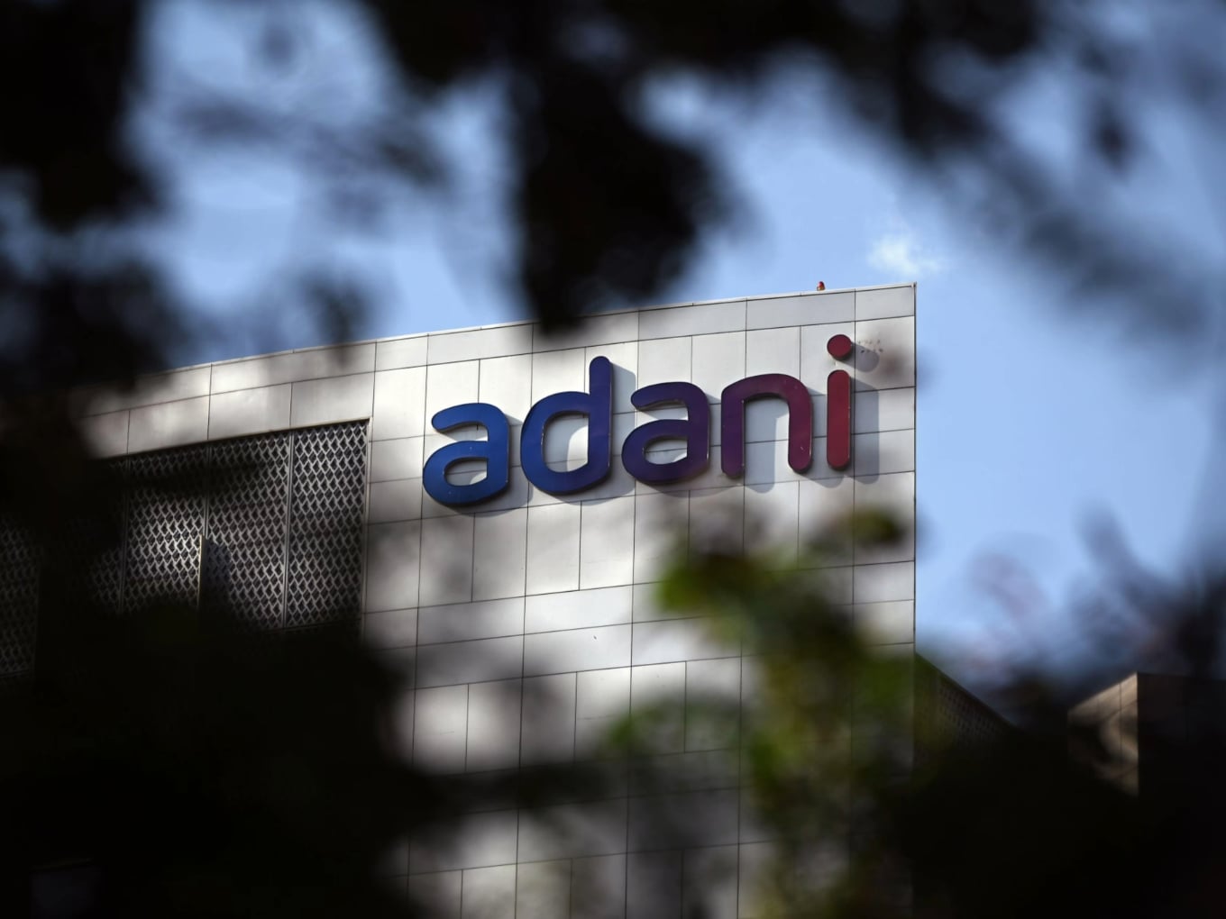 Map of India highlighting various states and union territories, with small icons representing startups and innovation, symbolizing the Adani Group's Vande Bharatam initiative to