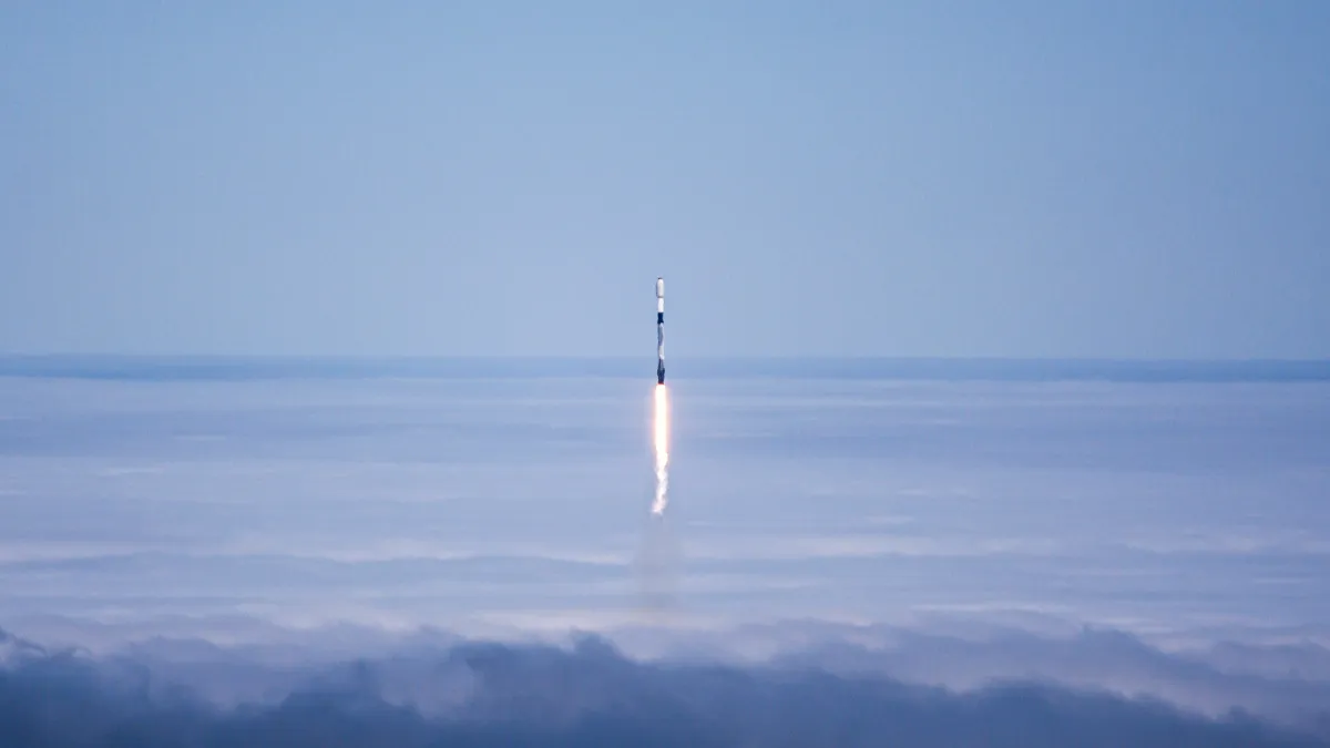 SpaceX rocket launch with stock market ticker overlay, symbolizing the company's IPO