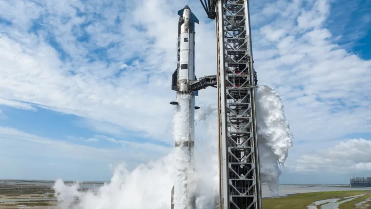 SpaceX Starship rocket on a launchpad with exhaust plumes