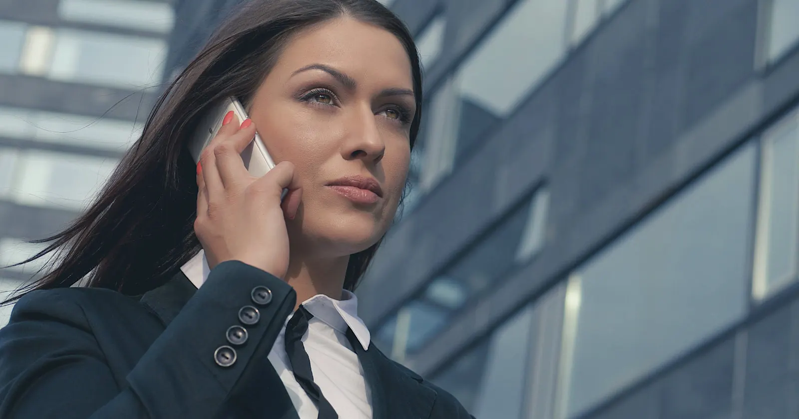 A smartphone displaying a generative AI chatbot interface, with a call icon suggesting business communication, illustrating the connection between AI and sales leads.