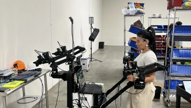 Andrew Ceja, a pilot at Encord, wears a Zander Labs headset that measures brain waves while he performs a physical task in a San Leandro warehouse.