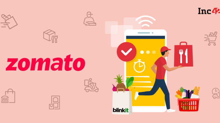 A user speaking into a smartphone, with a Zomato logo and AI-related graphics overlaid, illustrating voice-powered food ordering.