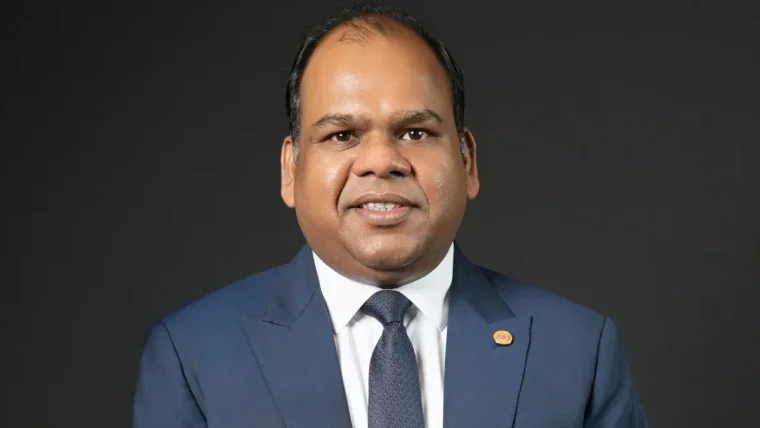 Yogesh Jain, Deputy CEO of AU Small Finance Bank, in a corporate setting