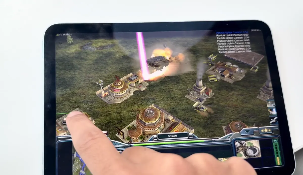 Screenshot of Command & Conquer: Generals Zero Hour running natively on an iPad, with touch controls visible.