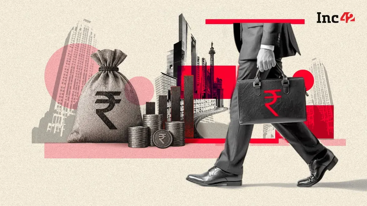 A graphic illustrating the trend of Indian startup funding with a distinct upward arrow for AI investments against an overall declining trend.