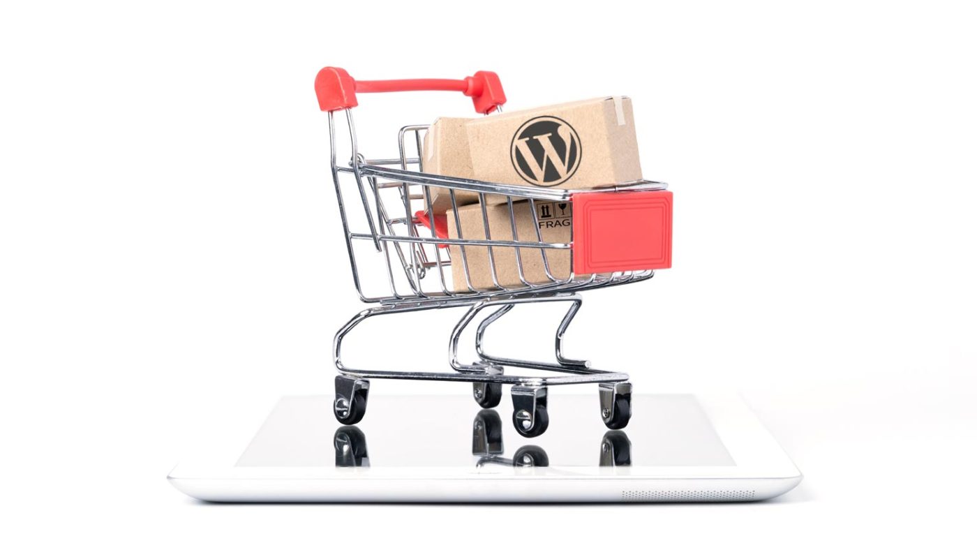 Laptop displaying digital ecommerce analytics and enterprise platform management tools.